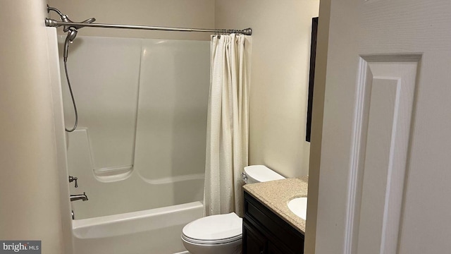 full bathroom featuring toilet, vanity, and shower / bath combo with shower curtain