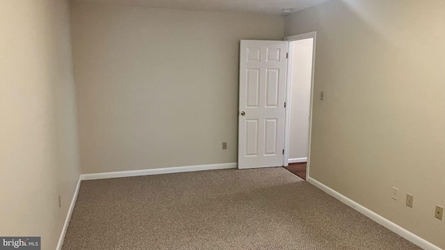 view of carpeted spare room