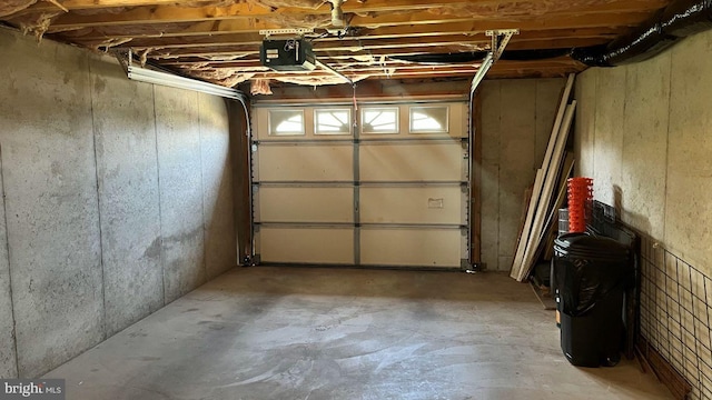 garage featuring a garage door opener