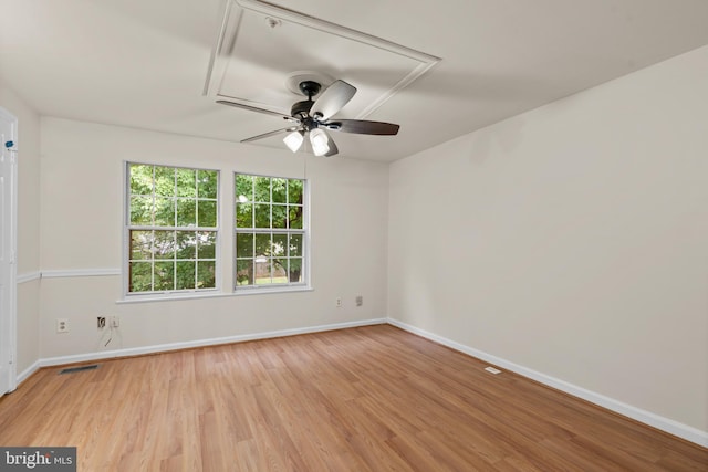 unfurnished room featuring ceiling fan and light hardwood / wood-style flooring