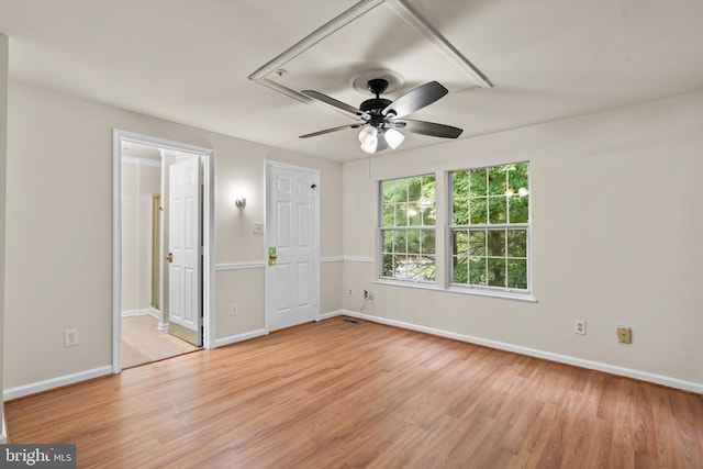 unfurnished bedroom featuring light hardwood / wood-style flooring and ceiling fan