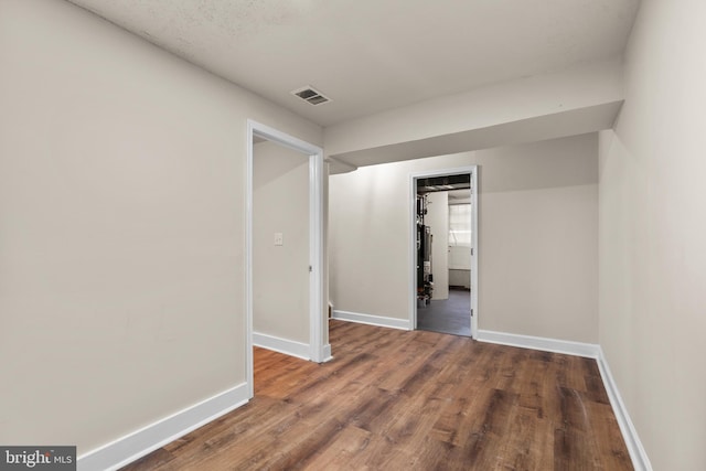 interior space with hardwood / wood-style flooring