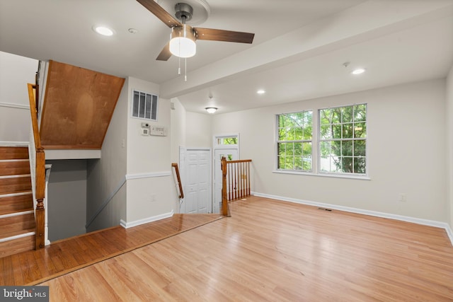 interior space with ceiling fan and light wood-type flooring