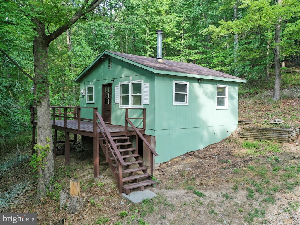 exterior space with a wooden deck