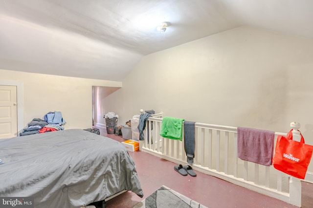 bedroom featuring vaulted ceiling