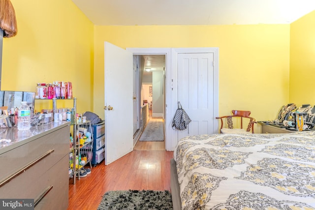 bedroom featuring light wood-type flooring