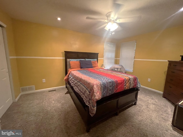 bedroom featuring ceiling fan and carpet flooring