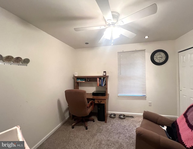 carpeted office with ceiling fan