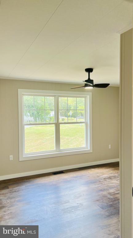 unfurnished room featuring ceiling fan