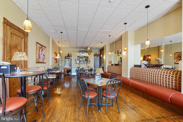 dining room with hardwood / wood-style flooring