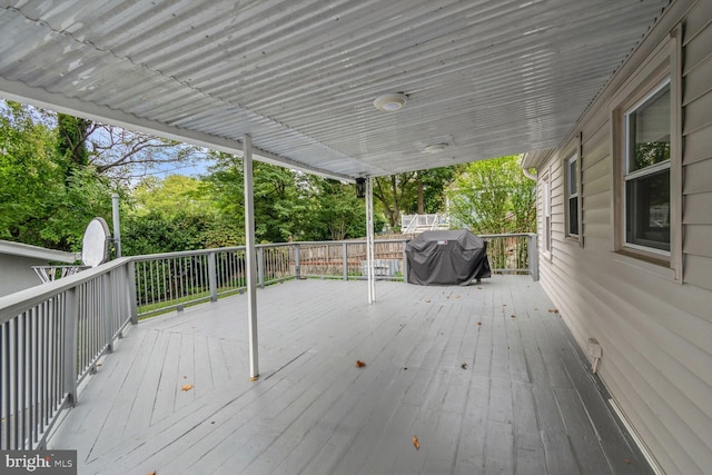 wooden deck featuring grilling area