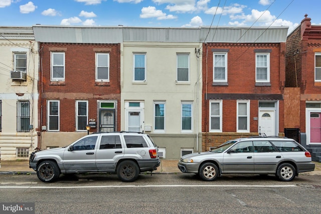 view of front of property with cooling unit