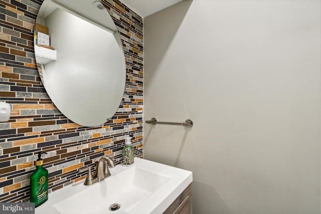 bathroom featuring backsplash and vanity