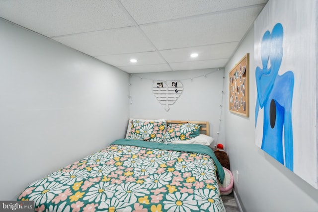 bedroom featuring a paneled ceiling