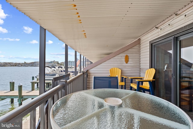 500 32nd St Unit A, Ocean City, MD 21842 - balcony with a water view and outdoor dining area