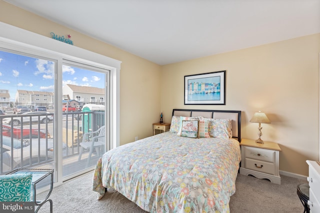 500 32nd St Unit A, Ocean City, MD 21842 - carpeted bedroom with access to outside and baseboards