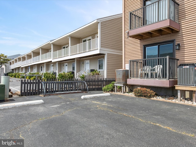 500 32nd St Unit A, Ocean City, MD 21842 - view of property featuring uncovered parking and central AC