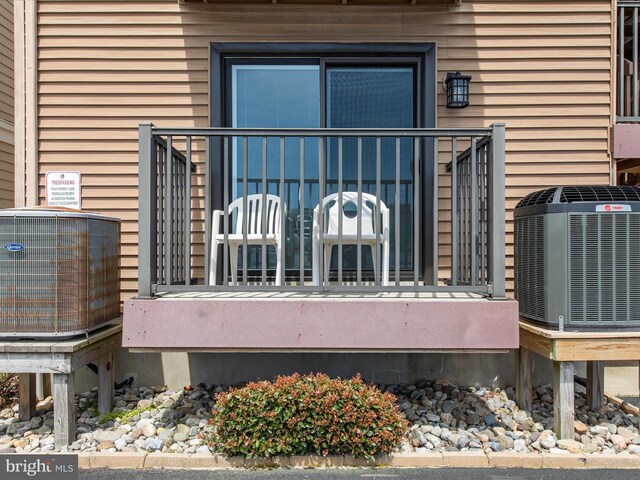 500 32nd St Unit A, Ocean City, MD 21842 - wooden terrace with central AC unit