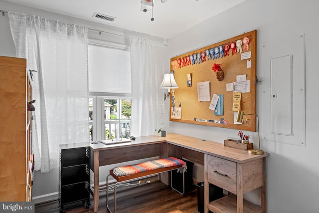 interior space featuring hardwood / wood-style floors and electric panel