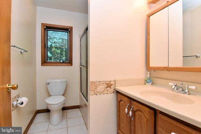 full bathroom featuring tile patterned floors, vanity, shower / bath combination with glass door, and toilet