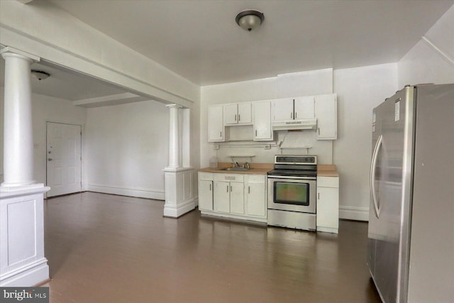 kitchen featuring stainless steel appliances, white cabinetry, sink, and decorative columns