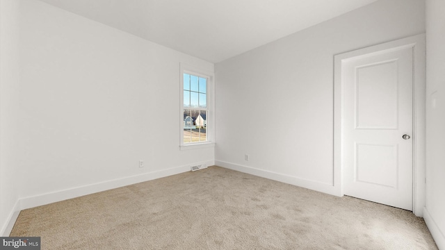 view of carpeted spare room