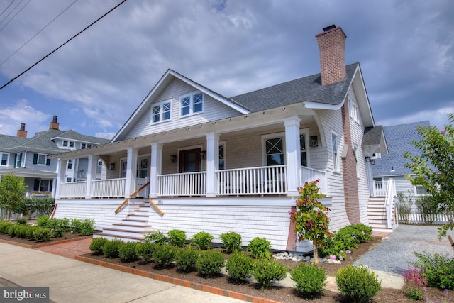 view of front of home featuring covered porch