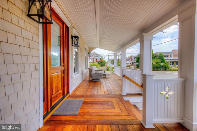 wooden deck with a porch