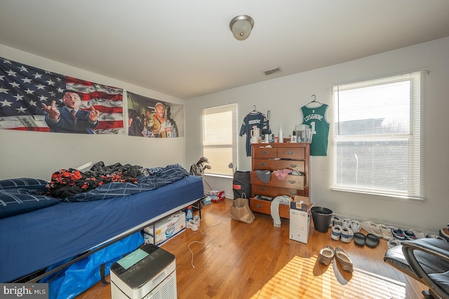 bedroom featuring hardwood / wood-style flooring