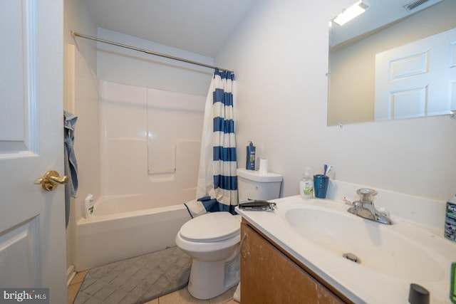 full bathroom featuring toilet, vanity, tile patterned flooring, and shower / bathtub combination with curtain