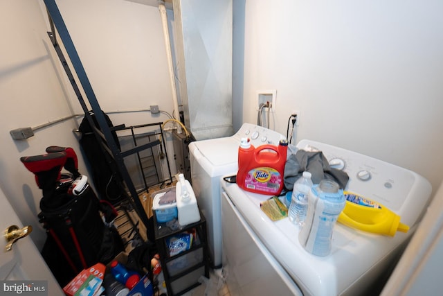 laundry room with washer and dryer