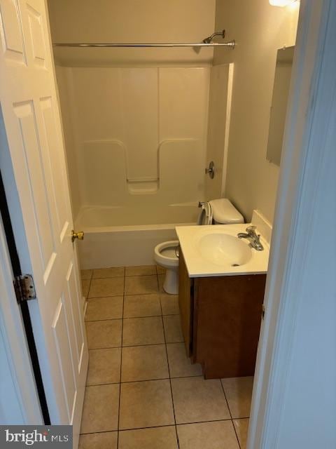 full bathroom with  shower combination, tile patterned floors, vanity, and toilet