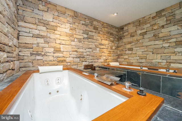 bathroom featuring a bathing tub