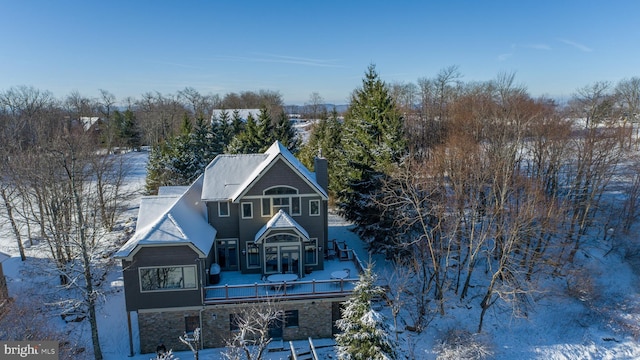 view of snow covered property