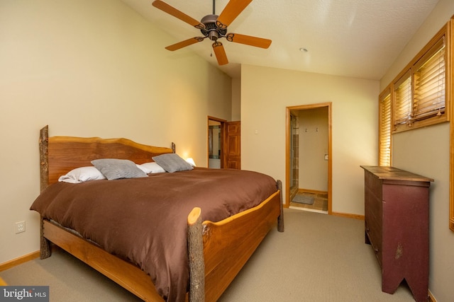 bedroom featuring ceiling fan, light colored carpet, and vaulted ceiling