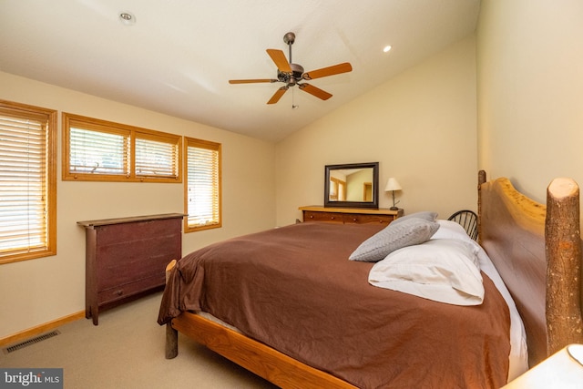 carpeted bedroom featuring ceiling fan and lofted ceiling