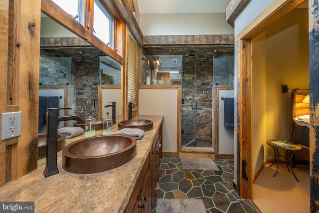 bathroom with vanity and an enclosed shower