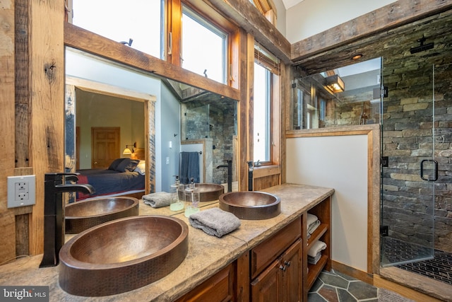 bathroom featuring vanity and walk in shower