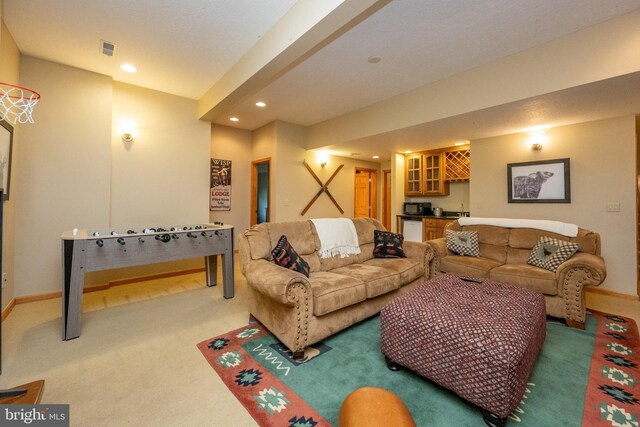 living room with carpet and bar area