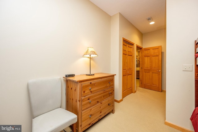 living area featuring light colored carpet