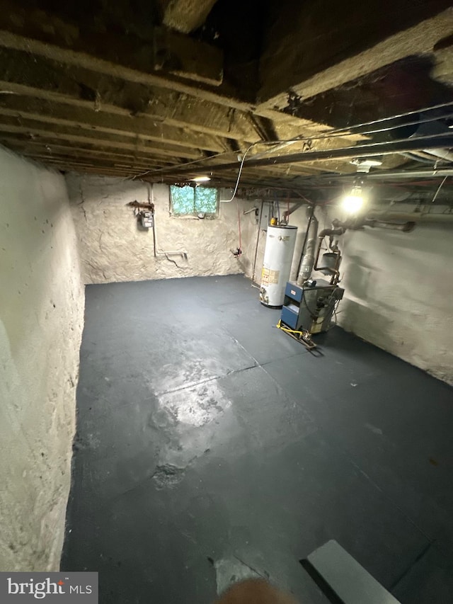 basement featuring water heater