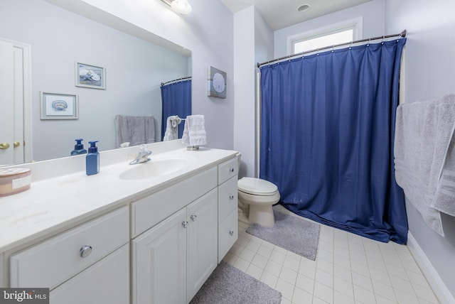 full bath featuring toilet, tile patterned floors, curtained shower, and vanity