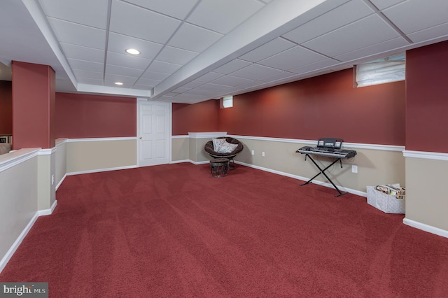 finished basement featuring recessed lighting, carpet, baseboards, and a drop ceiling