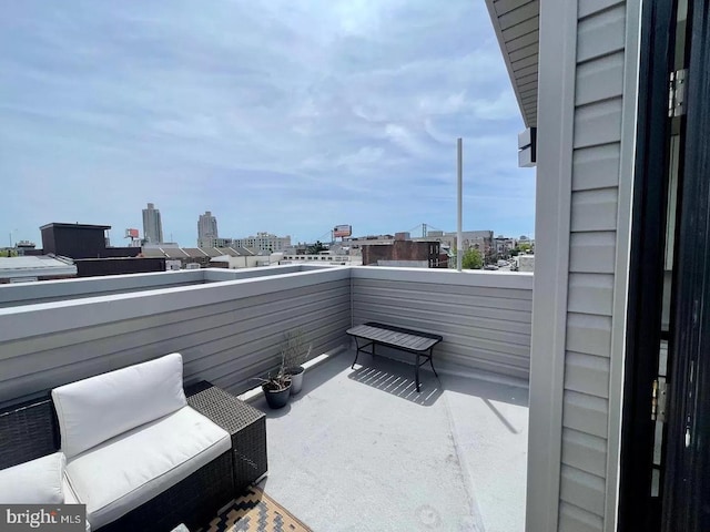 view of patio / terrace with a balcony