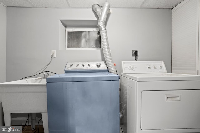 laundry room with washer and clothes dryer