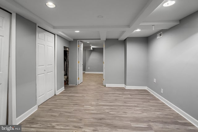 basement with light wood-type flooring