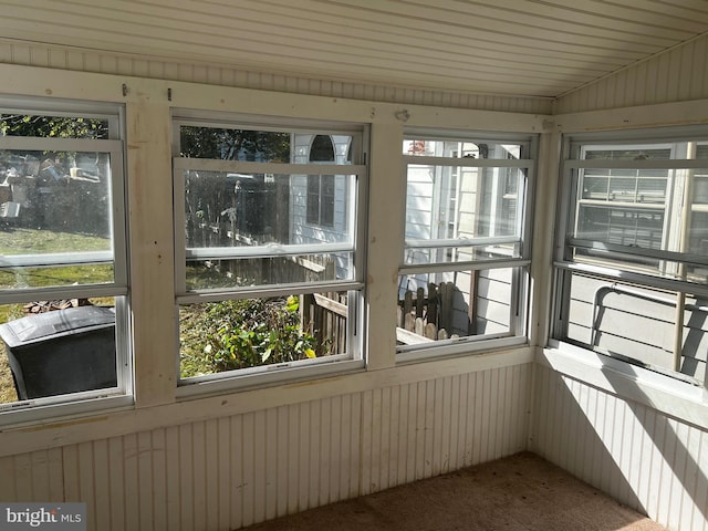 unfurnished sunroom with a wealth of natural light