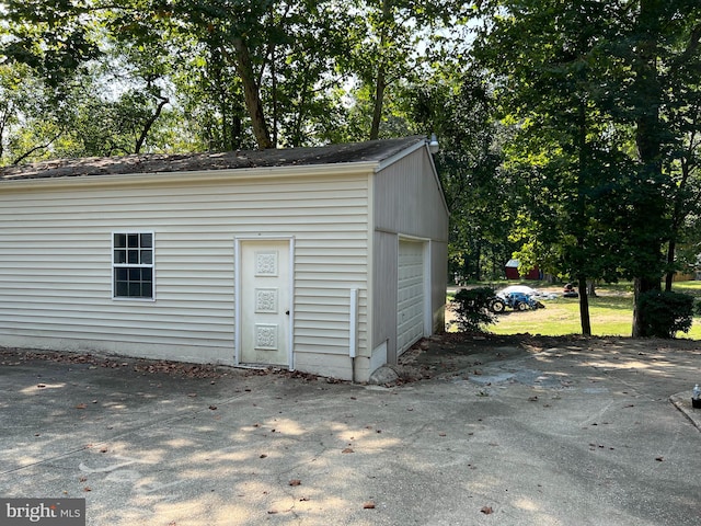 view of outdoor structure with a garage