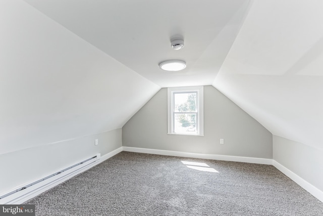 89 E Barber Ave, Woodbury, NJ 08096 - bonus room with vaulted ceiling, baseboard heating, carpet, and baseboards