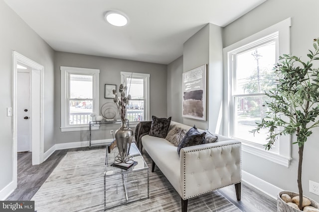 89 E Barber Ave, Woodbury, NJ 08096 - sitting room featuring baseboards and dark wood-style flooring